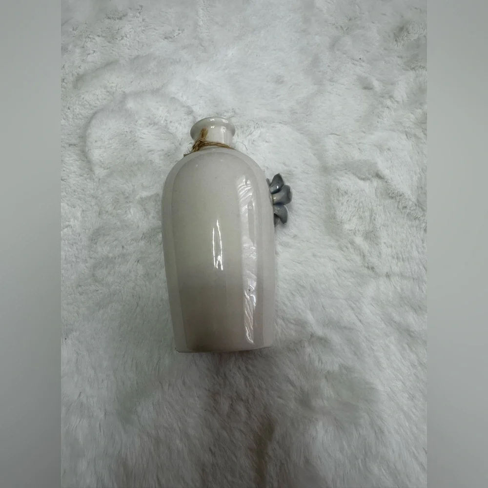 Elegant Cream Vase with light blue Floral Accent